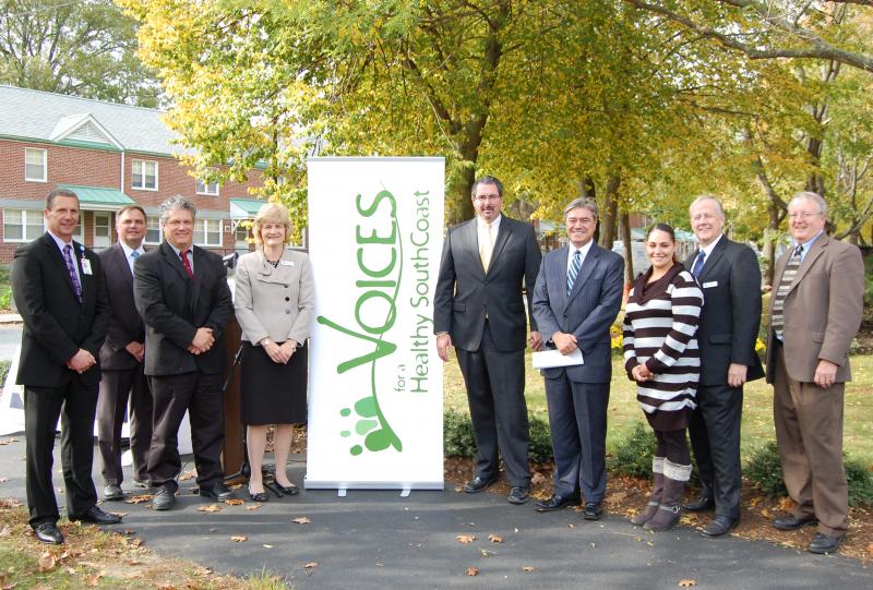 Pictured from left to right: Keith A. Hovan, President and CEO of Southcoast Health System and Southcoast Hospitals Group; State Representative Christopher Markey; Robert Collett, Director of Cape Cod Regional Tobacco Control Program; Nancy LaRue Bonell, Vice President & COO of YMCA Southcoast; Steven A. Beauregard, Executive Director of the New Bedford Housing Authority; State Representative Antonio F. D. Cabral; Melissa Gonsalves, resident of Presidential Heights; Dr. David Weed, Director of Healthy City Fall River. BY COURTESY PHOTO